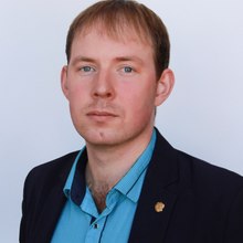 Алексей Комоликов