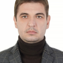 Александр Скорик